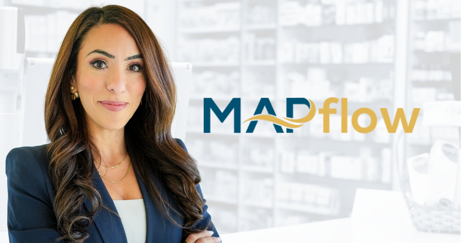 Nardine Nakhla smiling beside the MAPflow logo on a wall.
