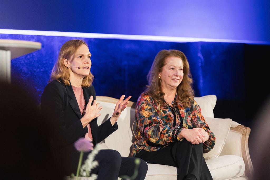 Janet Bannister (left) and Carol Leaman (right) take the stage for the event's fireside chat