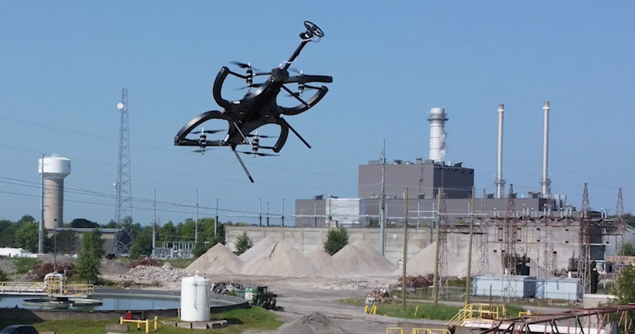 Skygauge Robotics drone flying over industrial site during inspection.
