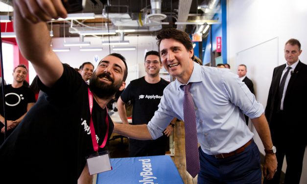 Applyboard employees taking a selfie with Justin Trudeau