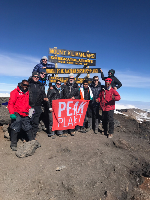 Group of people on top of Mount Kilimanjaro,Tanzania